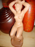 Careful Joseph combing terracotta nude