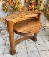 A modern Biedermeier desk made of wood in the style of Joseph Danhauser