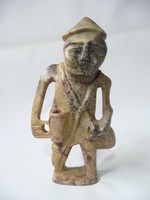 Grotesque stone figurine