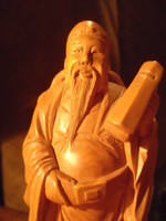 Wooden statue depicting Chinese sage