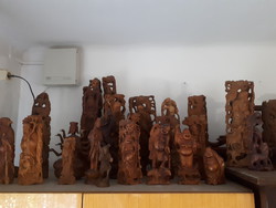 Carved oriental wooden sculptures / 32 pieces / for sale.