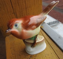 Little bird sitting on a branch in Herend - glued!