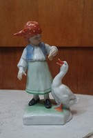 Little girl feeding herend porcelain goose