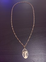 Antique gold chain with angelic pendant