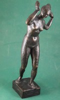 Tamás Gyenes: statue of a naked woman combing - small sculpture