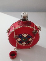 Old leather heart bottle.