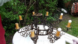 Large wrought iron chandelier with eight burners