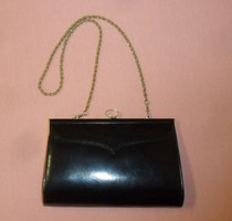 Eros' branded twisted chain women's casual purse.