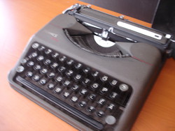 Free mail! Antique typewriter. Hermes baby type.