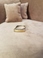 Silver design ring with gold overlay and zirconia stone