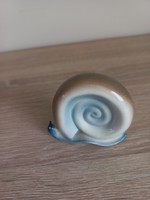 Aqua-painted aquincum porcelain is a rare snail with a small flaw