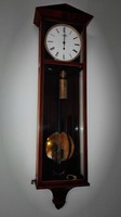 Large antique wall clock in working condition