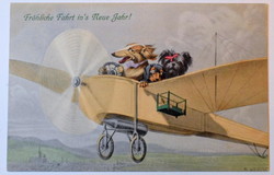 Régi M M Vienne  képeslap   Boldog Újévet  kutyák repülővel