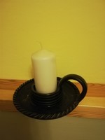 Ceramic candlestick with candle