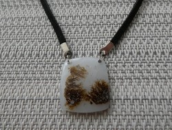 Agate pendant with natural dendritic pattern on leather necklace with nickel-free fitting.