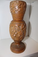 Large carved wooden vase with grape motif