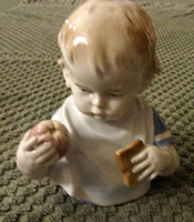 Child's head eating an apple