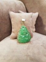Silver pendant with carved jade stone