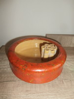 Pond ikebana bowl with flower arrangement