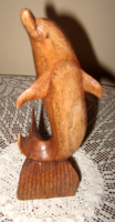 Carved dolphin figure