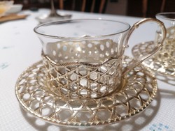 Tea or coffee cups with beautiful pierced metal holder and base, silver color, in perfect condition