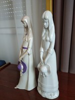 2 large porcelain figurines of a girl in a hat