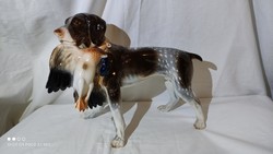 Large porcelain German Vizsla dog with hunter prey