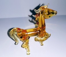 Glass galloping horse