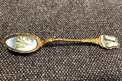 Old enamelled spoon with the inscription 