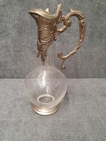 Glass jug with metal spout