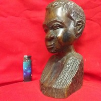 African carved wooden bust statue.
