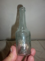 Antique small glass bottle of domestic luna salt