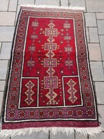 Afghan nomadic hand-knotted rug in nice clean condition. Negotiable!