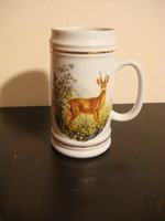 Hunter scene with beer mug