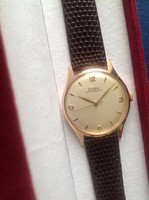 Doxa men's gold watch is a novel 14 kt men's gold watch with a sparing gift