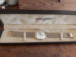 Longines 18k gold men's watch with 14k gold strap.
