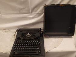 1, -Ft antique olympia-plana functional typewriter from the 1930s
