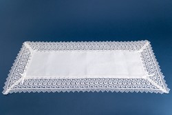 Lacy tablecloth, centerpiece
