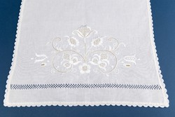 Lacy tablecloth, centerpiece, hand-crocheted lace on the edge.