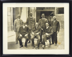 An important group picture of men, perhaps depicting the leaders of a company. Original paper image.