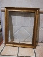 Old wooden picture frame with glass