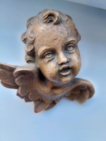 Carved putto head 9 cm high