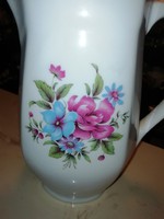 Old porcelain jug with spout marked