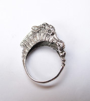 Showy silver ring with seahorse.