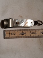Old pearl cigar cutter