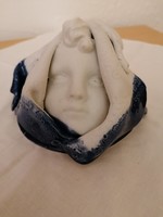 Art gallery: female face in scarf