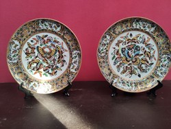 Couple with antique chinese porcelain plate.