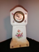 Antique table clock in a ceramic case