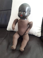 Bakelite-headed Negro doll in the xx. From the middle of Sz