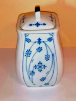 Old porcelain salt shaker with onion flower pattern